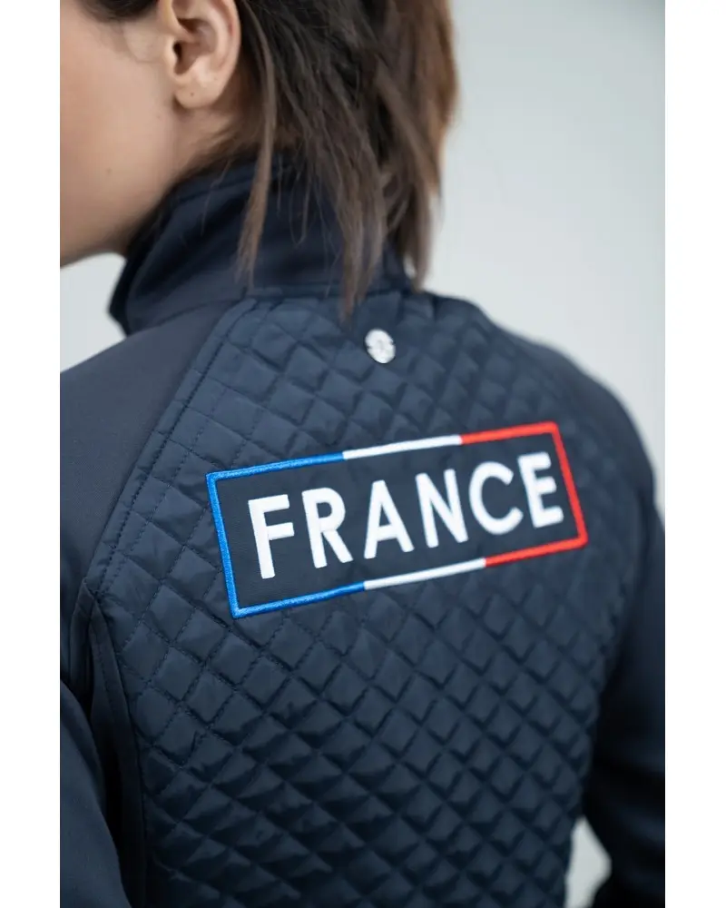 jiminy-veste-technique-femme-rider-france (1).webp